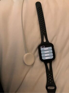 Apple Watch Series 5 GPS 44mm with black sports band and charger